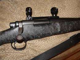 Remington 700 in .220 swift with 3-12x56 swarovski scope and arnold jewell trigger, gun is like new used for deer and fox.