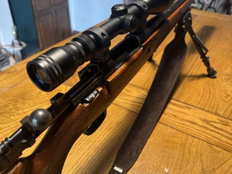 Remington .308 bolt action rifle and moderator