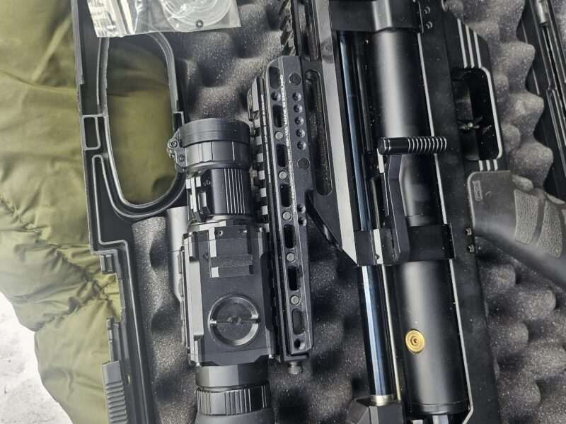 FX MAVERICK BLACK COMPACT in 177 sub 12. like new with Pard 008lrf scope